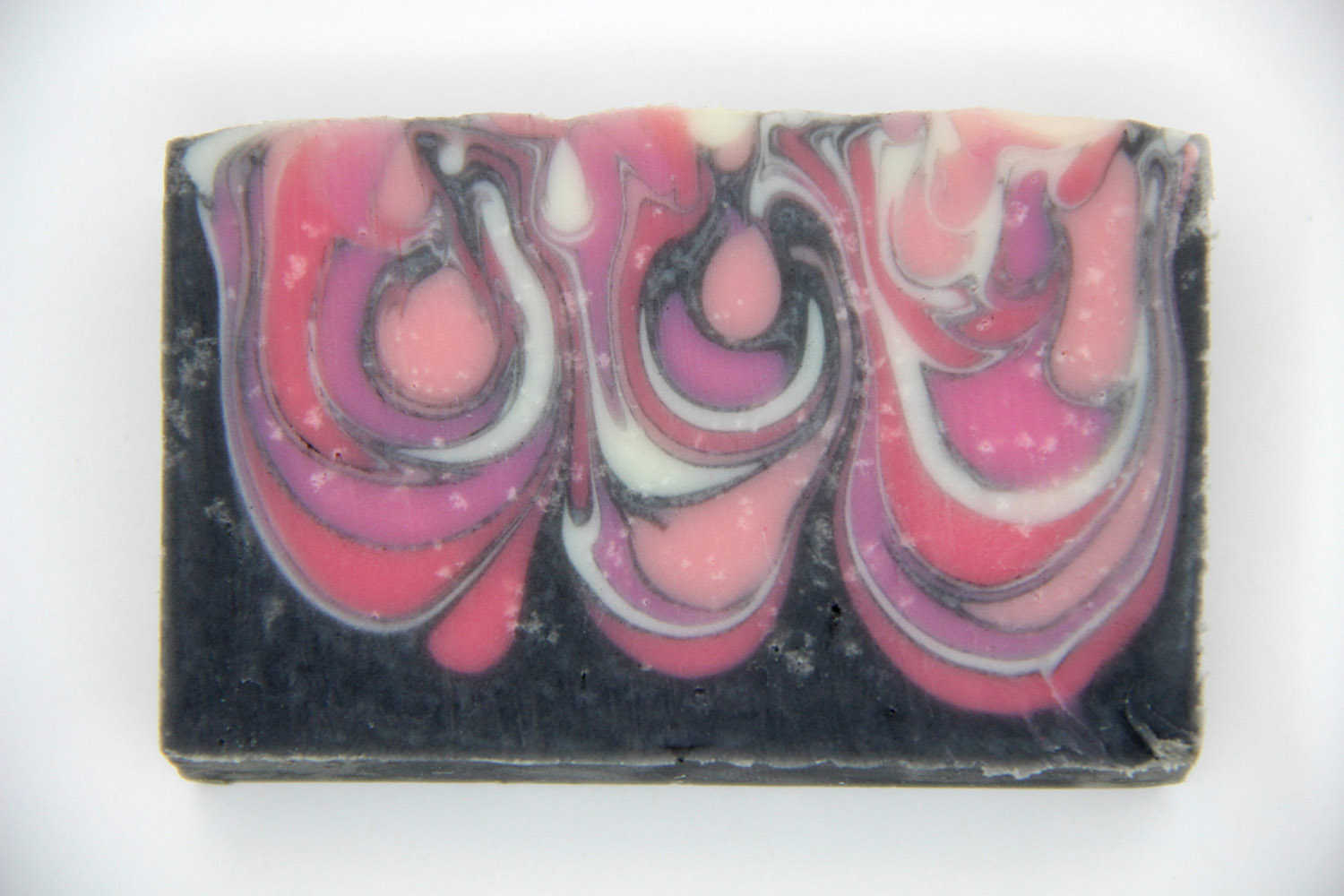 Close-up of moisture droplets known as glycerin dew on a melt and pour soap bar